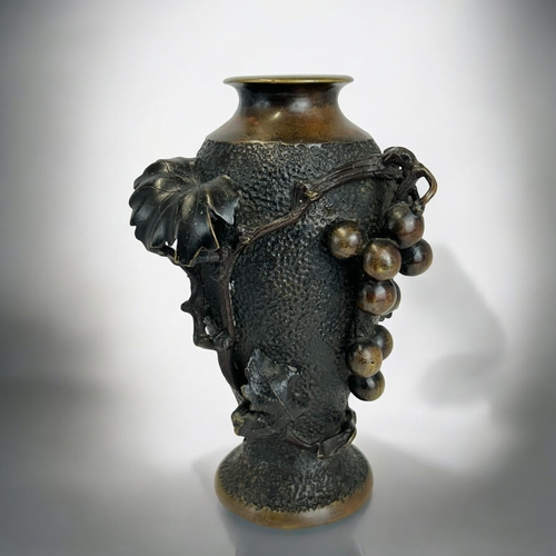 166 - A Japanese Bronze vase.Meiji period, CA 1900.High relief decorated 'Grape & Vine'.Marked to base... 