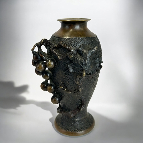 166 - A Japanese Bronze vase.Meiji period, CA 1900.High relief decorated 'Grape & Vine'.Marked to base... 