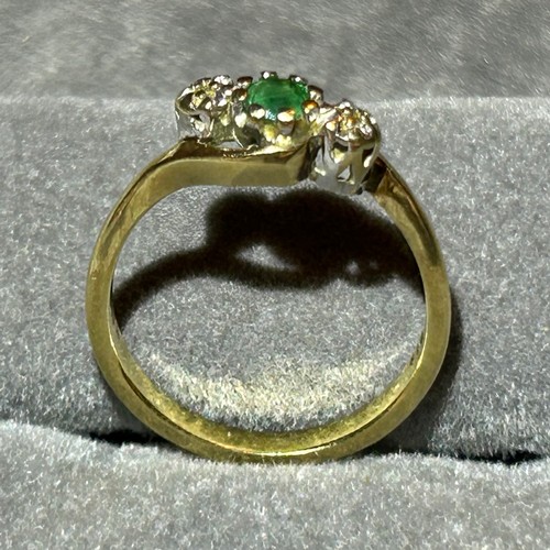 354 - A 9ct gold diamond and emerald three stone ring, approx UK size M, 2g