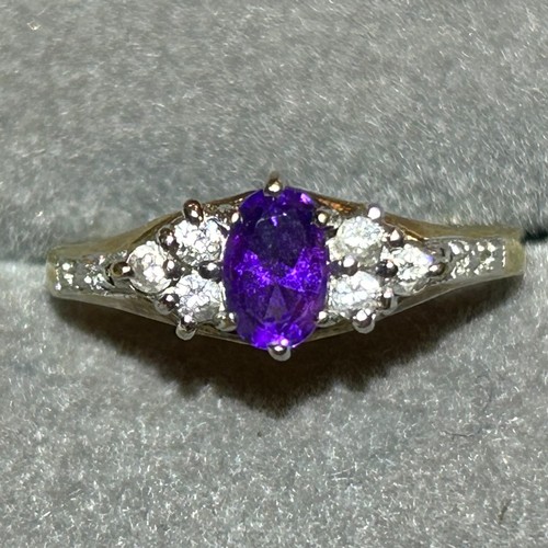 356 - A 9ct gold amethyst and white stone ring, approx UK size O, 2g