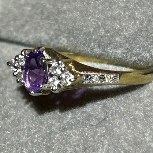 356 - A 9ct gold amethyst and white stone ring, approx UK size O, 2g