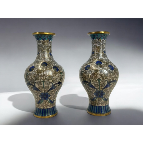 230 - A small pair of Japanese cloisonne vases.Meiji period, 19th century.Finely detailed stylised foliate... 