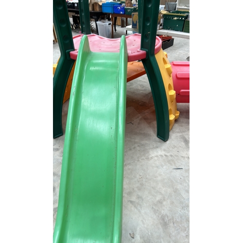 366 - Colorful plastic play set with slide and climbing frame, approximately 120 cm high.