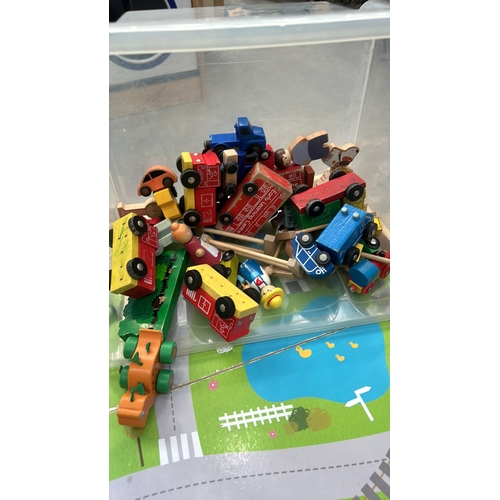 371 - Collection of vintage wooden toy vehicles and figures, featuring colorful designs. Includes activity... 