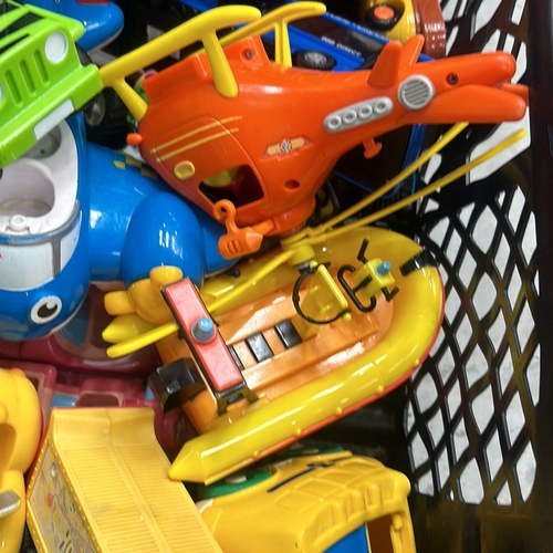 374 - Collection of colorful plastic toys, including helicopters, trains, and vehicles. Assorted designs.