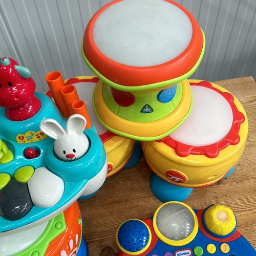 376 - Little Tikes musical toy set includes a keyboard, microphone, and xylophone in bright colors.