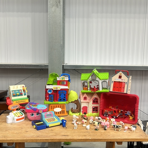 378 - Vintage Fisher-Price toy set featuring playhouses and accessories. Includes various colorful plastic... 