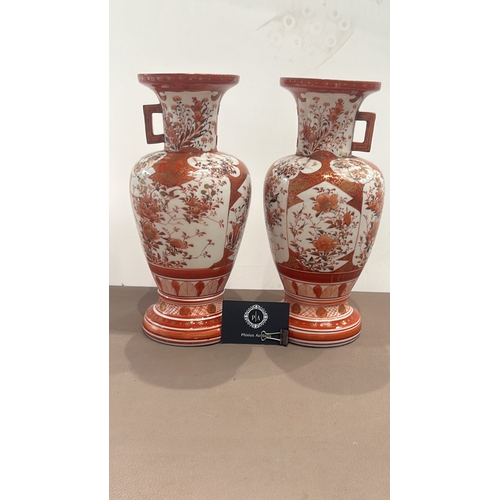 382 - A pair of Japanese Meiji Period Kutani  porcelain vase with floral and geometric motifs, featuring r... 