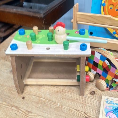 385 - Wooden construction and play set features natural and colorful blocks, including a bench with pegs a... 