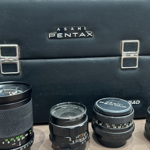 388 - Asahi Pentax vintage camera lenses with case, Nikon Pronea S camera with strap, and a Canon carrying... 