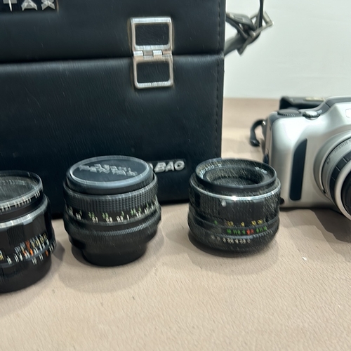 388 - Asahi Pentax vintage camera lenses with case, Nikon Pronea S camera with strap, and a Canon carrying... 