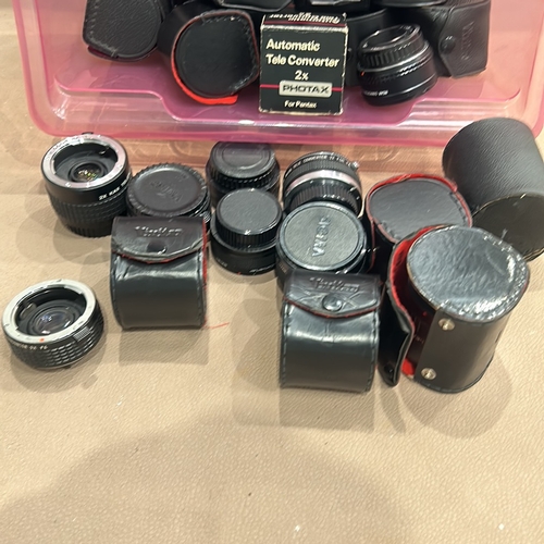 394 - Collection of teleconverter lenses, including Photax, Vivitar, and Sigma. Various models for Pentax.... 