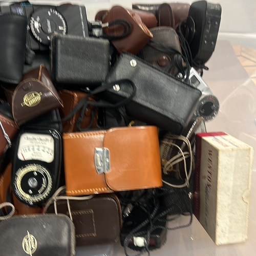 397 - Collection of vintage light meters and accessories in leather cases, including Weston brand, stored ... 