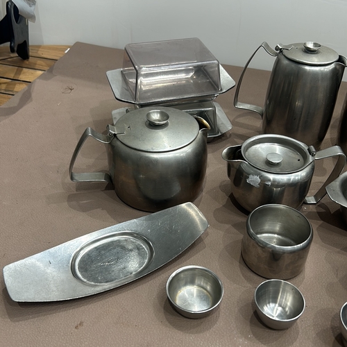 402 - Mid-Century Modern stainless steel tea and coffee set by Old Hall. Includes teapots, sugar bowl, mil... 