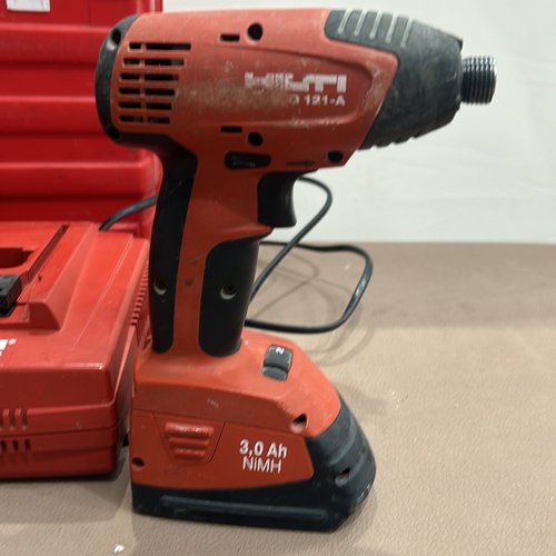 404 - Hilti SFH 151-A Cordless Impact Driver, 3.0 Ah NiMH. 2 cordless work lights. Includes two Hilti NiMH... 