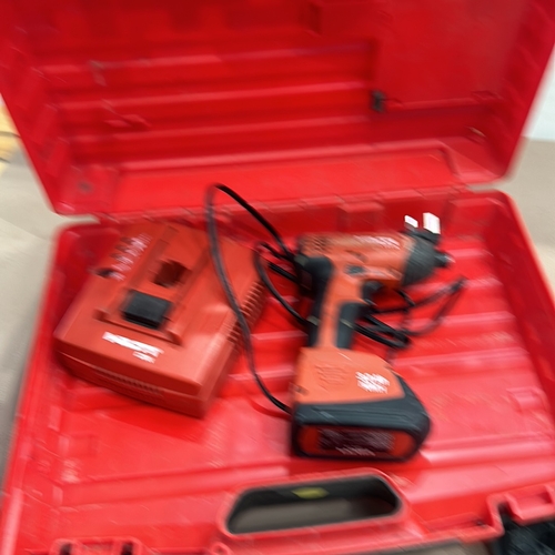 404 - Hilti SFH 151-A Cordless Impact Driver, 3.0 Ah NiMH. 2 cordless work lights. Includes two Hilti NiMH... 