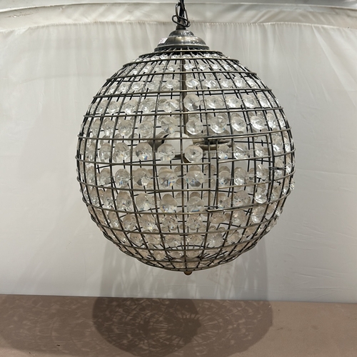 406 - Contemporary crystal type chandelier with spherical openwork metal frame, adorned with faceted glass... 