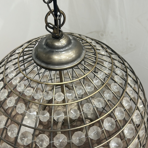 406 - Contemporary crystal type chandelier with spherical openwork metal frame, adorned with faceted glass... 