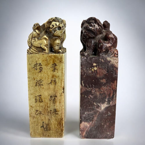 231 - A large pair of Chinese carved stone seals.Qing dynasty. Each carved with Shishi Lion with pair of c... 