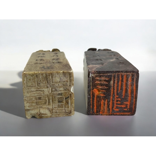 231 - A large pair of Chinese carved stone seals.Qing dynasty. Each carved with Shishi Lion with pair of c... 