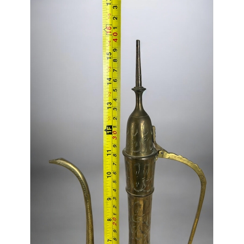 385 - Three vintage Indo-Persian brass Surahi Aftaba water ewers.Tallest - 40cm