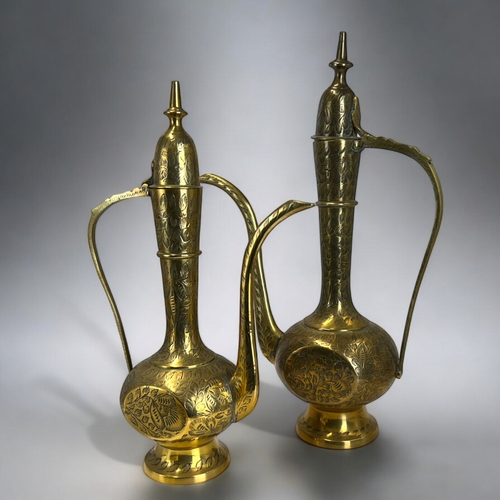 385 - Three vintage Indo-Persian brass Surahi Aftaba water ewers.Tallest - 40cm