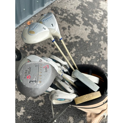 292 - 1 x set golf clubs and trolley- including Taylor made and vantage