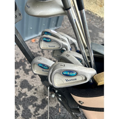 292 - 1 x set golf clubs and trolley- including Taylor made and vantage