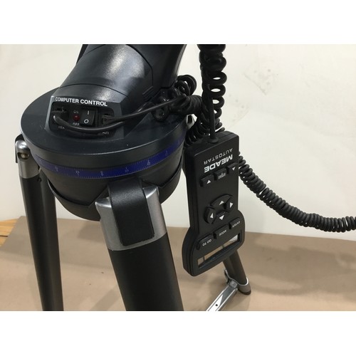 346 - Astronomical telescope on tripod legs and battery operated adjust