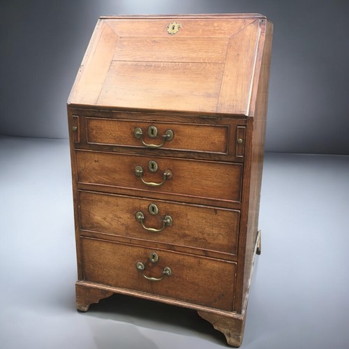 356 - 19th Century Oak Clerks/Ladies Bureau of Small Size, having 4 Graduating Drawers, and 6 Internal Dra... 