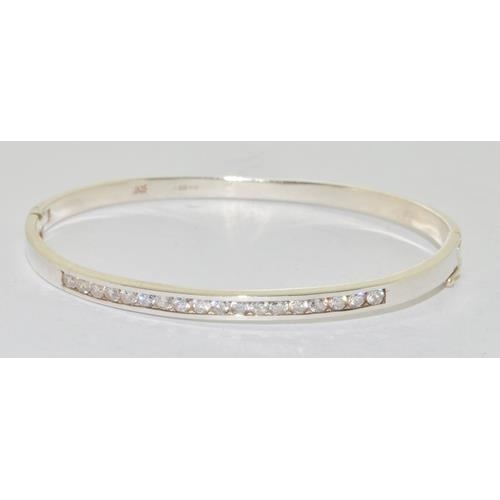 239 - 925 silver CZ set bangle.