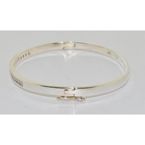 239 - 925 silver CZ set bangle.