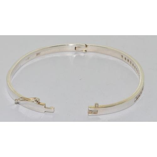 239 - 925 silver CZ set bangle.