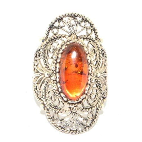 241 - A large amber 925 silver filigree ring Size P