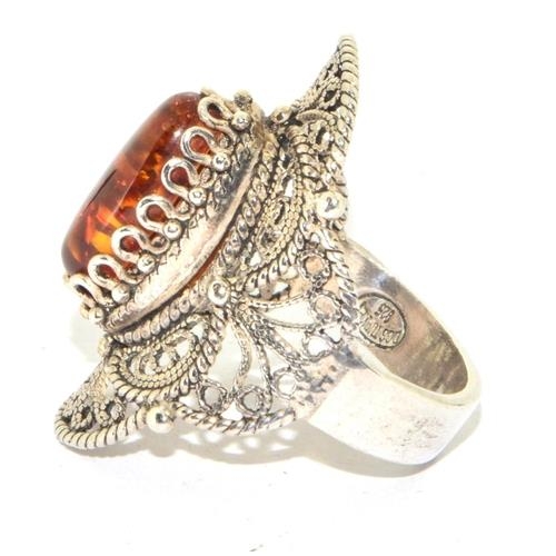 241 - A large amber 925 silver filigree ring Size P