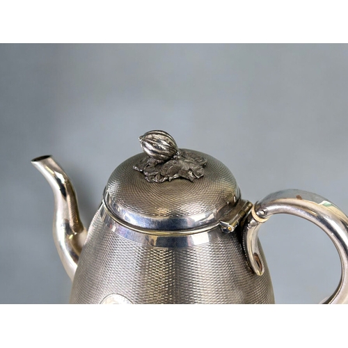 223 - A fine quality silver plate tea set.William Gough, Birmingham (C1850).Overall engine turned basket w... 