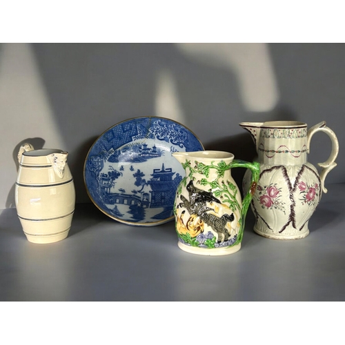 290 - A collection of 19th century English pottery.Includes a Burton barrel shaped pitcher, A Masons 'hunt... 