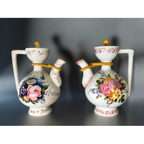 291 - A pair of 19th century Paris porcelain vases.Hand painted sprays of flowers with moulded, gilded des... 