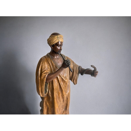 297 - A large Friedrich Goldscheider (Austrian, 1845 - 1897) 'Arab snake charmer' figure. Designed by G. G... 