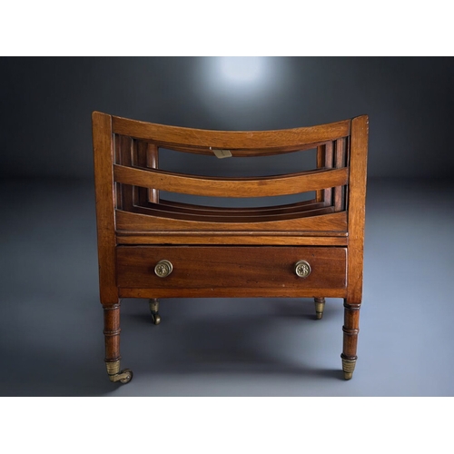 404 - A Regency period Mahogany Canterbury.English, C1810.Bowed divisions, with central frieze drawer. Sto... 