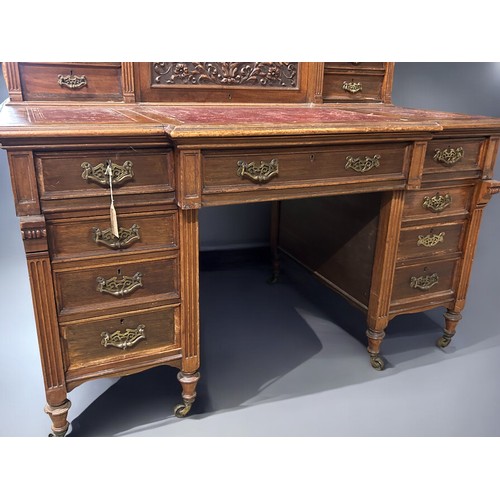 406 - A Victorian pedestal desk.Each pedestal set with three drawers. Further drawers to top gallery with ... 