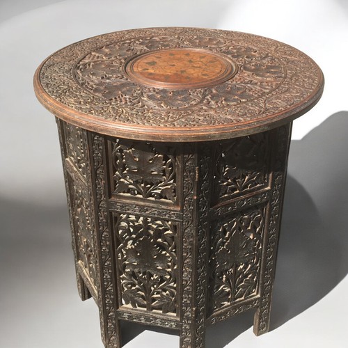 358 - Early 20th Century Indo Persian Carved Wood Collapsible Table with Brass Inlay. Heavily carved Folia... 