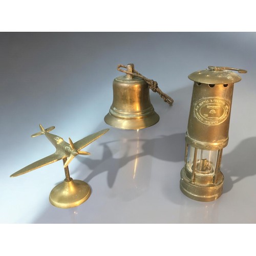 17 - Welsh Miners Lamp by E Thomas and Williams Ltd Cambrian No 5694, Brass Spitfire and a Bronze Bell.