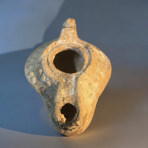 89 - Roman-Byzantine-Holy land Clay oil lamp. Charred nozzle from use.L 8cm x Dia 6.5cm