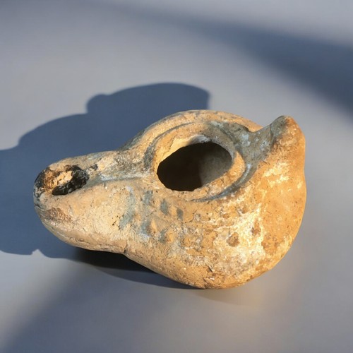 89 - Roman-Byzantine-Holy land Clay oil lamp. Charred nozzle from use.L 8cm x Dia 6.5cm