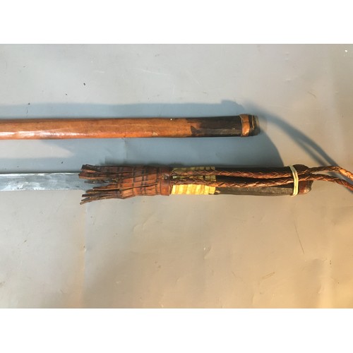 47 - Vintage West African Slavers Fulani or Takoba, Tuareg sword in 2 tone leather scabbard with fringe a... 