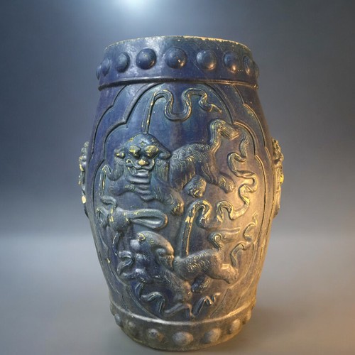 161 - A Chinese Qing Dynasty Barrel Shaped Earthenware Blue Glazed Garden Seat, Having Foo Dog Decoration ... 