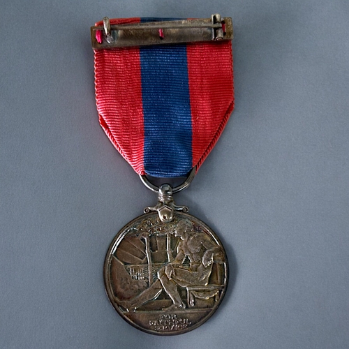 428 - A boxed Imperial service medal, George V.Awarded to Alfred Vodden Edwards.With ribbon & case.... 