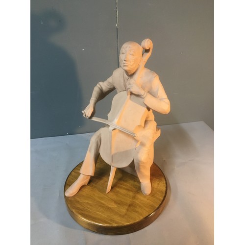 73 - Large Terracotta Cellist - Dated for 1983 with Sculpture and Monogrammed H.R.K...Height 45cm