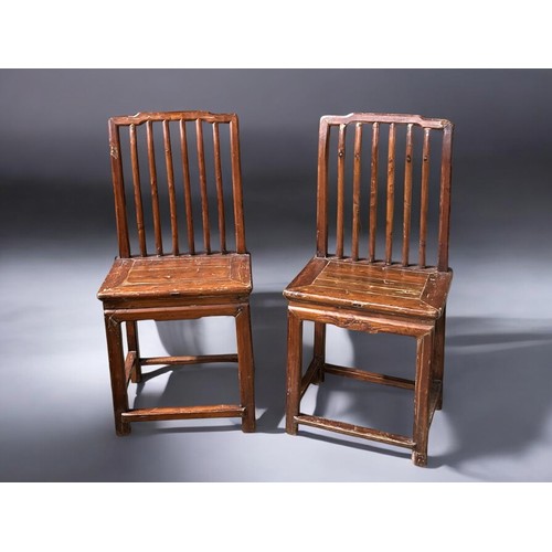 408 - A PAIR OF CHINESE CARVED PROVINCIAL CHAIRS. Late Qing dynasty. Probably Northern Provinces.